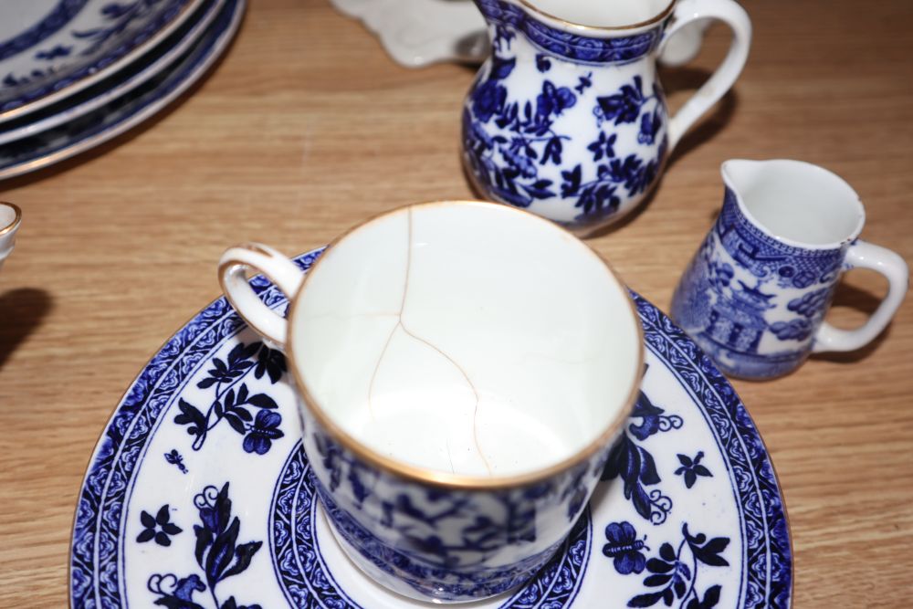 A collection of blue and white dinner ware and a Cauldon dinner service